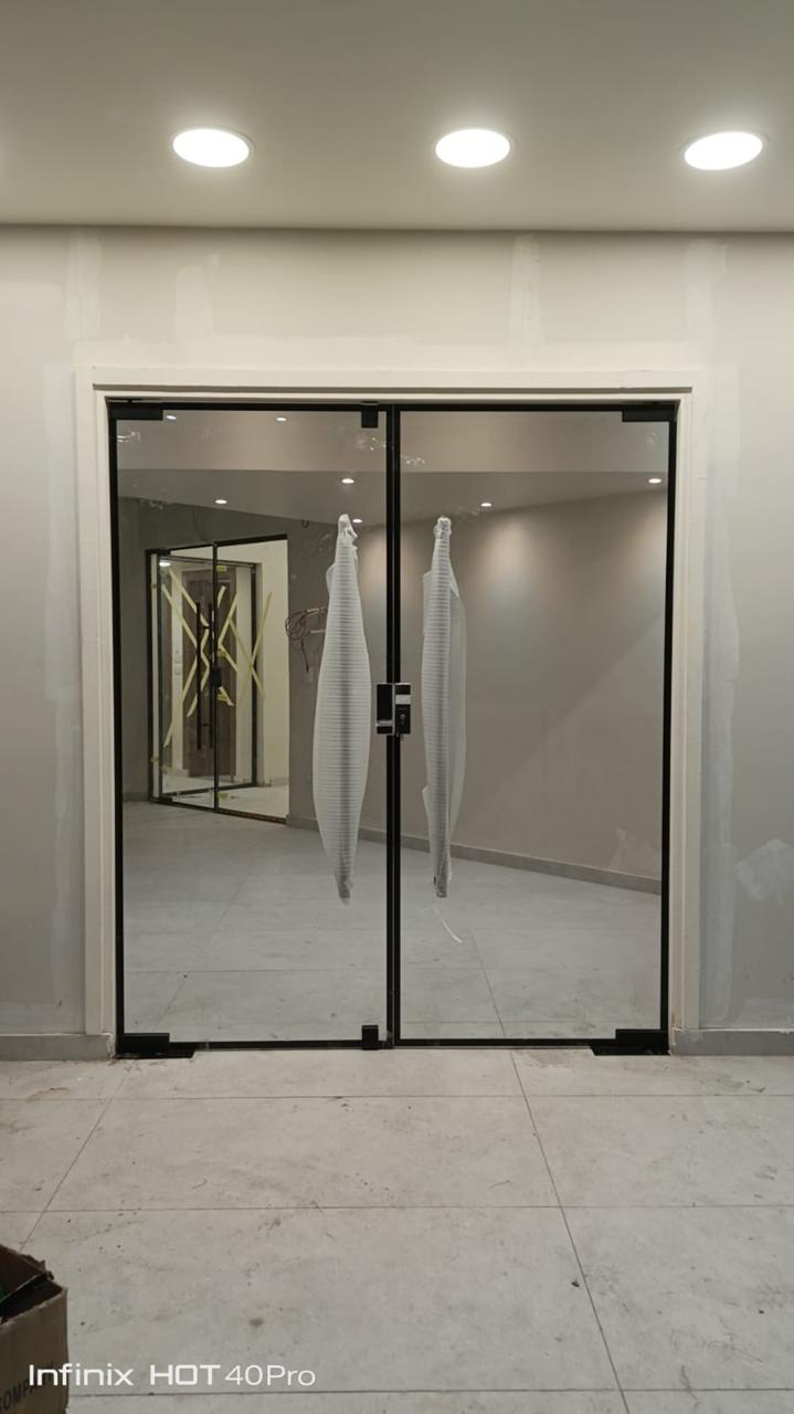 أبواب زجاج أوتوماتيكية • Automatic Tempered Doors